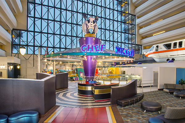 Chef Mickey restaurant inside Disney's Contemporary resort with Monorail going by