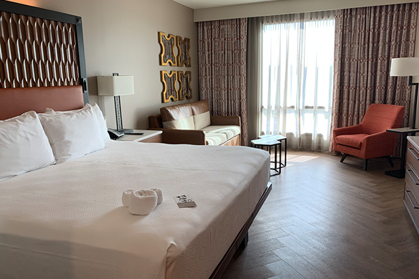 Inside Disney's Coronado Springs Hotel room with king bed
