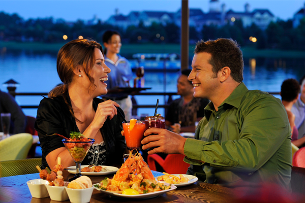 Couple dining at Big River Grill at Disney Boardwalk