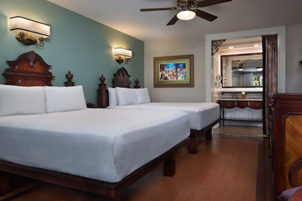 Inside hotel room of Disney's Port Orleans French Quarter with 2 queen beds