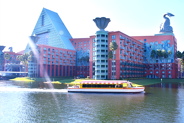 Walt Disney World Friendship boat sailing by Walt Disney World Dolphin Resort