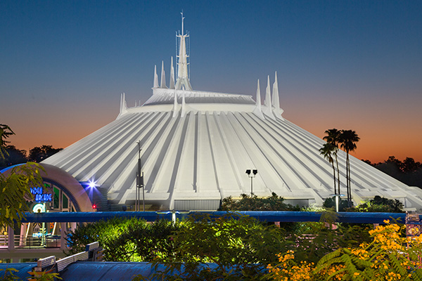 outside of Disney's space mountain at sunset